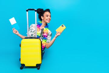 Full size photo of nice young girl inside suitcase empty space wear shirt isolated on blue color background