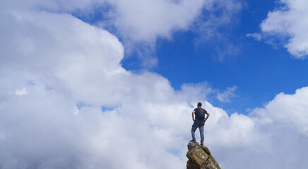 Hiker. Hiker on a crag in the Natural Park of Aiako Harriak, Euskadi.