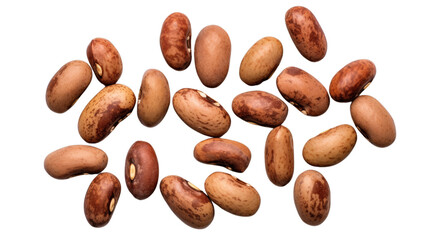 Close-up of multiple pinto beans scattered , showcasing their unique speckled patterns and brown hues.