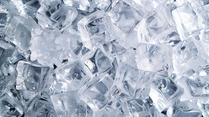 Crystal clear ice cubes as background, top view
