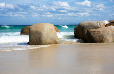 Granite boulders on shoreline, Bay of Fires, Tasmania.