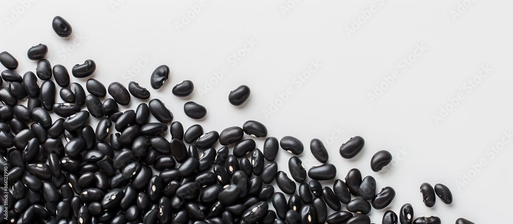 Aufkleber Black beans arranged neatly with plenty of white space around them for additional elements in a copy space image.