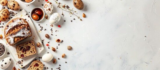 Easter-themed display with sweet chocolate bread, colorful quail eggs on a white backdrop, conveying a breakfast concept for Easter holidays with a vintage touch and room for text or image