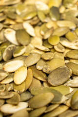 Peeled pumpkin seeds, kernels close-up