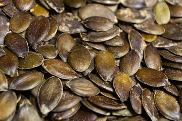 Peeled pumpkin seeds, kernels close-up