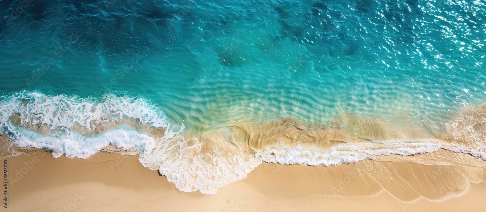 Poster aerial view of a sandy beach with transparent blue and turquoise waters, suitable as a horizontal ba