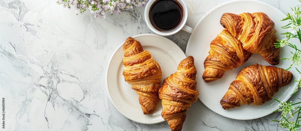 Poster Breakfast table adorned with fresh French croissants, presented in the image with ample copy space for text.