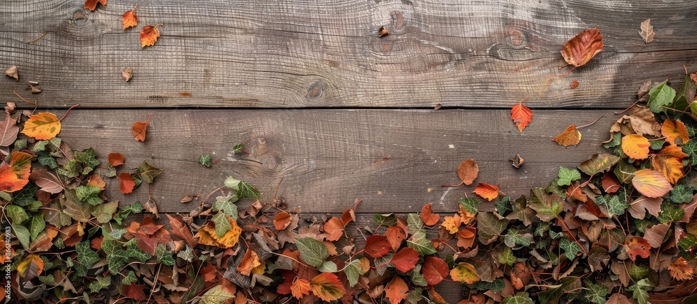 Poster autumn leaves showcased on a wooden backdrop with a flat view, perfect for a copy space image.