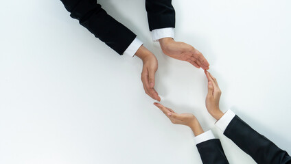 Business people collaborate business synergy and cooperation, join hand as frame around empty blank...