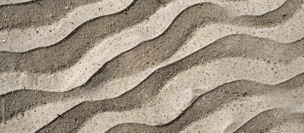 Poster Close-up view of natural beach sand texture with wavy ground, creating a background, seen from the top with copy space image.