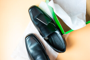Black men shoes with packaging. The view from the top.