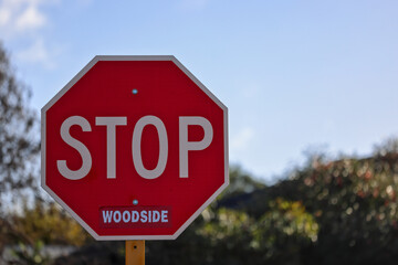 Public display of disapproval, protest against oil and gas inudstry in Australia. Sticker added to road, traffic STOP sign. Climate change, global warming, environmental