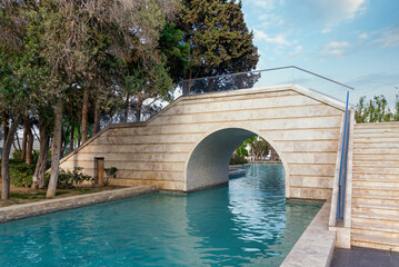 The Boulevard canals, or Little Venice, in Baku, Azerbaijan, surrounded by lush greenery