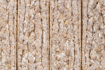 Texture of fresh crispy cereal bread top view.