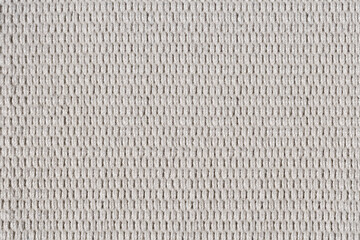 Texture of large knitted woolen fabric top view