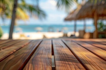 An elegant, teak beach table in the foreground with a blurred background of a luxury private island resort. The background includes white sandy beaches and crystal-clear waters