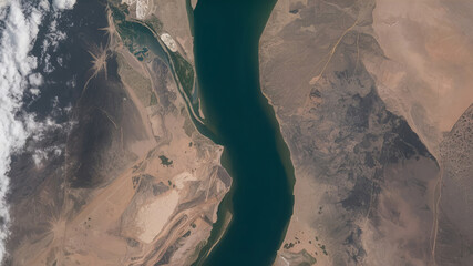 Naklejka premium The Indus River cuts through northern Pakistan, view from the space station.