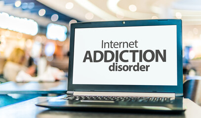 Computer displaying the sign of Internet addiction disorder