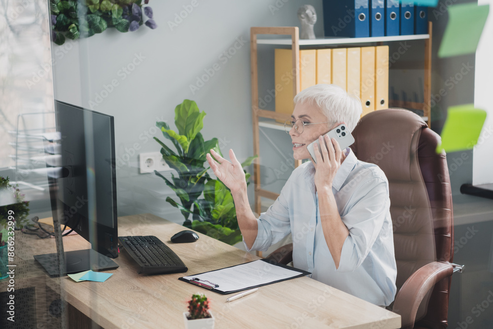 Sticker photo of happy charming senior lady secretary wear formal shirt communicating modern gadget indoors 