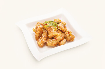 Deep Fried Hot Garlic Spareribs served in plate isolated on grey background side view of hong kong food