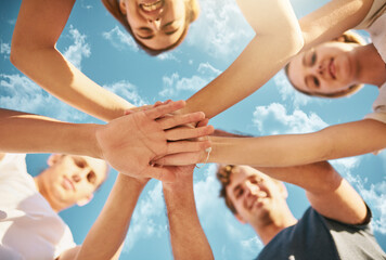 Hands, huddle and sky with people outdoor in summer together from below for solidarity or unity....