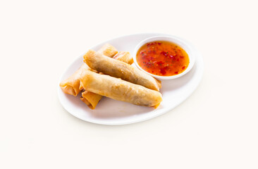 Deep Fried Chicken and Shrimp Spring Roll with chilli sauce served in plate isolated on grey background side view of hong kong food