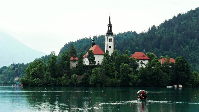 The Assumption of Mary Pilgrimage Church on a small island in the middle of the lake Bled