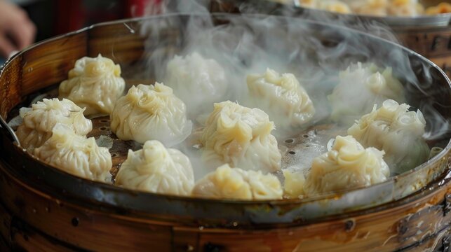 Dimsum or dumplings are being made or steamed