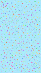 Colorful sprinkles scattered on a light blue background, creating a festive and playful design