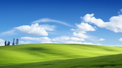 Obraz premium Serene landscape with rolling green hills under blue sky with fluffy white clouds. Peaceful scenery of nature, tranquility and serenity.