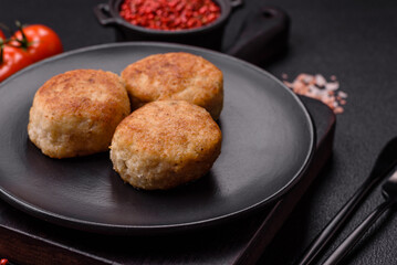 Delicious fresh fried minced fish cutlets with spices and herbs