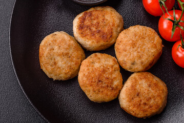 Delicious fresh fried minced fish cutlets with spices and herbs