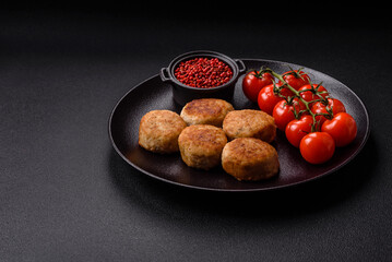 Delicious fresh fried minced fish cutlets with spices and herbs