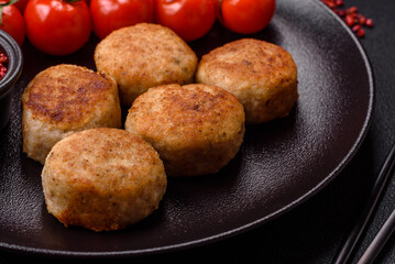 Delicious fresh fried minced fish cutlets with spices and herbs