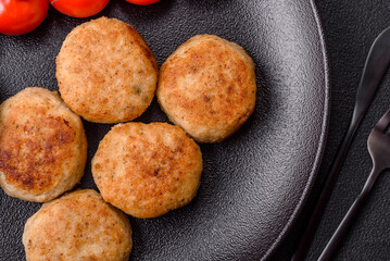 Delicious fresh fried minced fish cutlets with spices and herbs