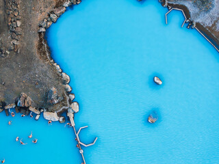 Aerial view of the Blue lagoon in Iceland. The most famous and popular SPA place in Iceland. Landscape from air. Vacation image. Blue and hot water in geothermal lake. © Aerial Film Studio