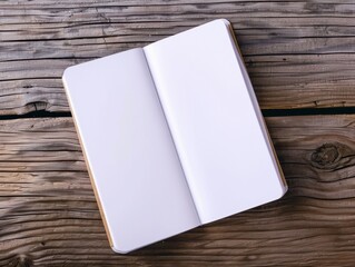 Fototapeta premium Open blank notebook on rustic wooden table, ready for writing, drawing or planning. Ideal for creative projects and note-taking.