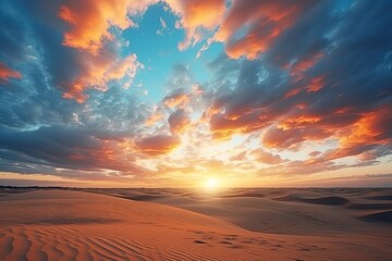 beautiful sunset over sandy desert landscape with a large cloud in the sky