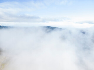 Amazing Cloud Inversion Over Mountain In The Lake Distract From Above