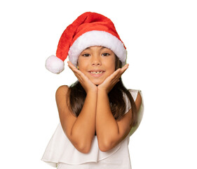 Portrait of a little girl in red santa hat on transparent background.