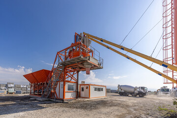 Concrete batching plant preparing concrete for a construction project