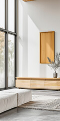 Stylish sideboard next to a big window filling the room with natural lighting in a residential interiors composition. Real Estate and architectural advertising with copy space.