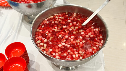 Tasty fresh appetizing watermelon drink smoothie. Watermelon drink with slices of watermelon.