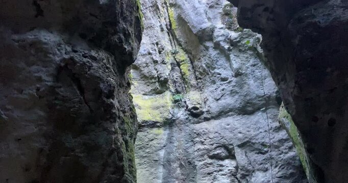 Beautiful shot inside a cave in the mountains with light entrances. Beautiful natural landscape between rocks. Ribera del Duero.