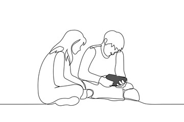 woman and man are sitting on the floor, man is holding a tablet in his hands - one line art vector. concept friends, sibling couple, students
