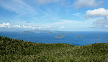 Tortola viewed from Gorda Peak on Virgin Gorda. The smaller islands in the foreground are The Dogs....