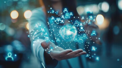 Woman's Hand Holding a Globe of Connected People