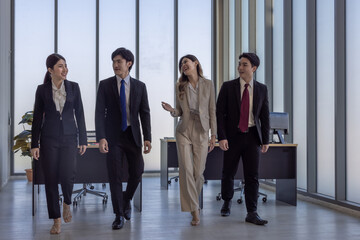 Business Team Walking Together