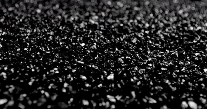Black sand grunge background. Сlose-up.