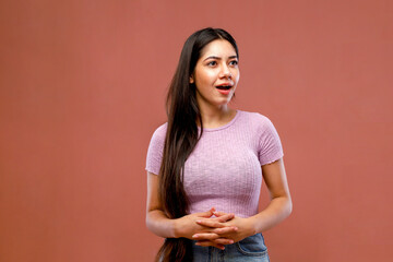 Obraz premium A Joyful Woman Is Giving Joyful Facial Expressions While Posing